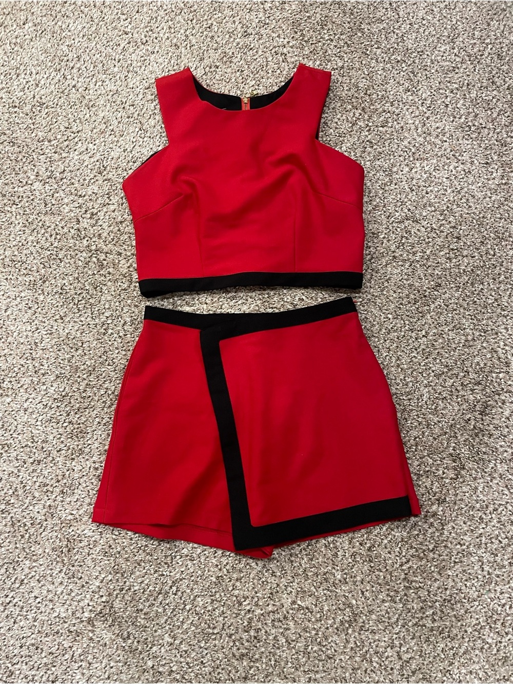 Red Two-Piece Skirt Set with Black Trim